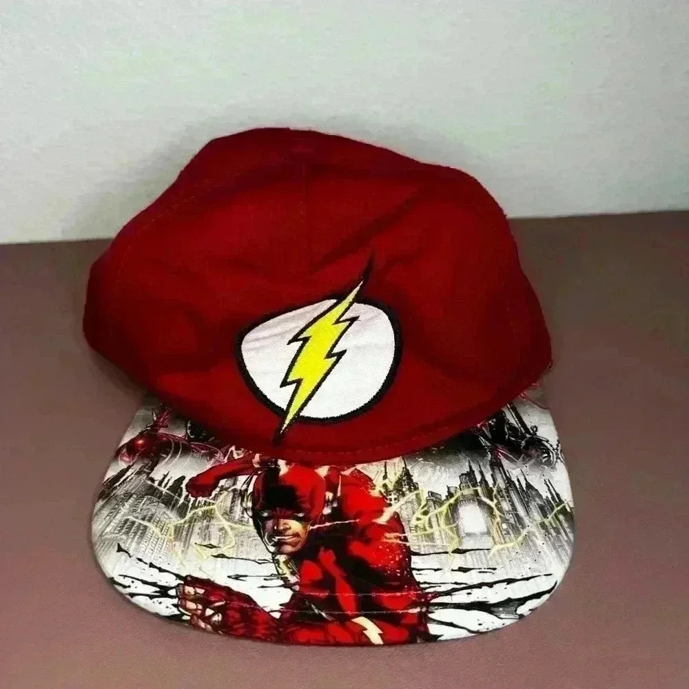 The Flash Youth Size Snap Back Red With A Multi Colored Brim Logo Hat / Cap